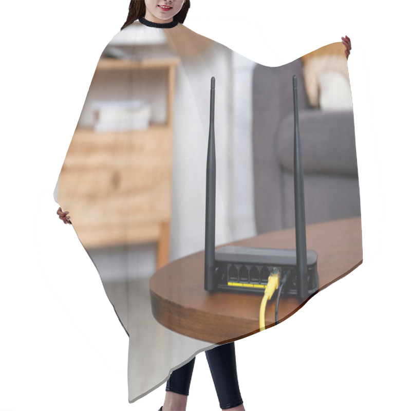 Personality  Modern Wi-Fi Router On Wooden Table Indoors. Space For Text Hair Cutting Cape