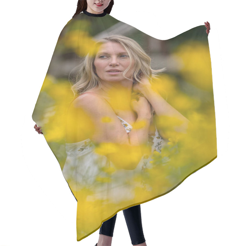 Personality  A Beautiful Blonde Model Strolls Through A Field Of Vibrant Yellow Flowers, Striking Poses For Portraits. The Late Summer Sun Casts A Warm Glow Over The Scene, Highlighting Her Grace And Natural Beauty. Hair Cutting Cape