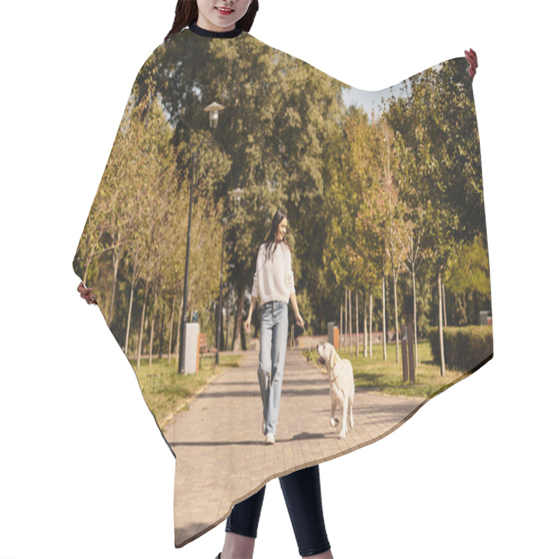 Personality  A Beautiful Woman In Warm Autumn Clothing Strolls Through A Peaceful Park With Her Dog. Hair Cutting Cape