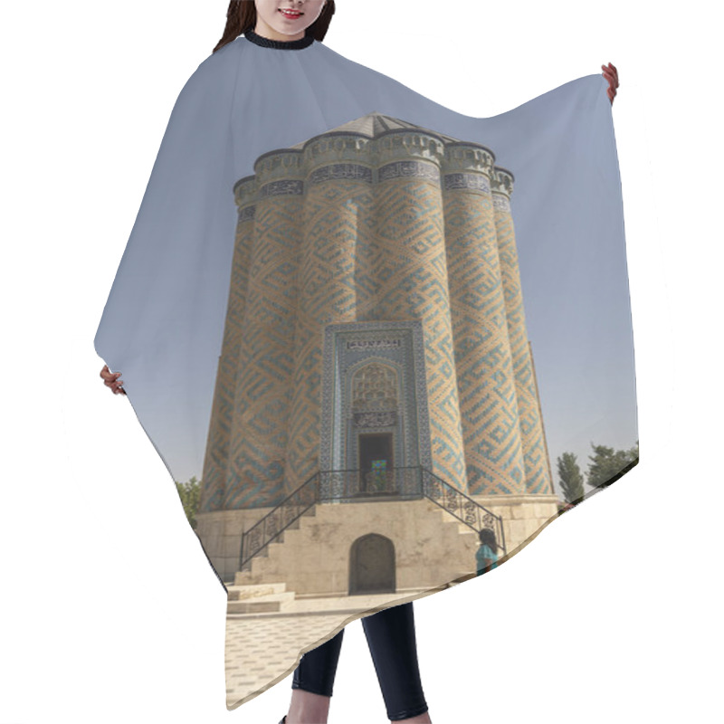 Personality  A Woman Walks Near The Historic Garabaghlar Mausoleum In Nakhchivan, Azerbaijan. The Bright Sunny Day Highlights The Intricate Architecture And Serene Surroundings Of This Ancient Landmark. Hair Cutting Cape