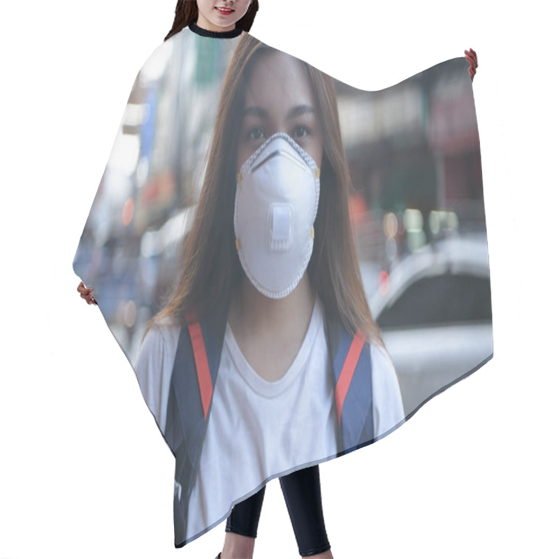 Personality  Concept Of Pollution Prevention. A Beautiful Woman Wearing A Mas Hair Cutting Cape