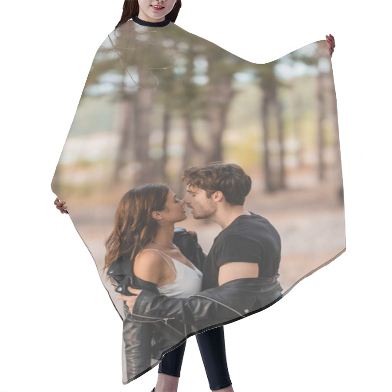 Personality  Side View Of Man Kissing And Taking Off Leather Jacket From Girlfriend In Forest  Hair Cutting Cape