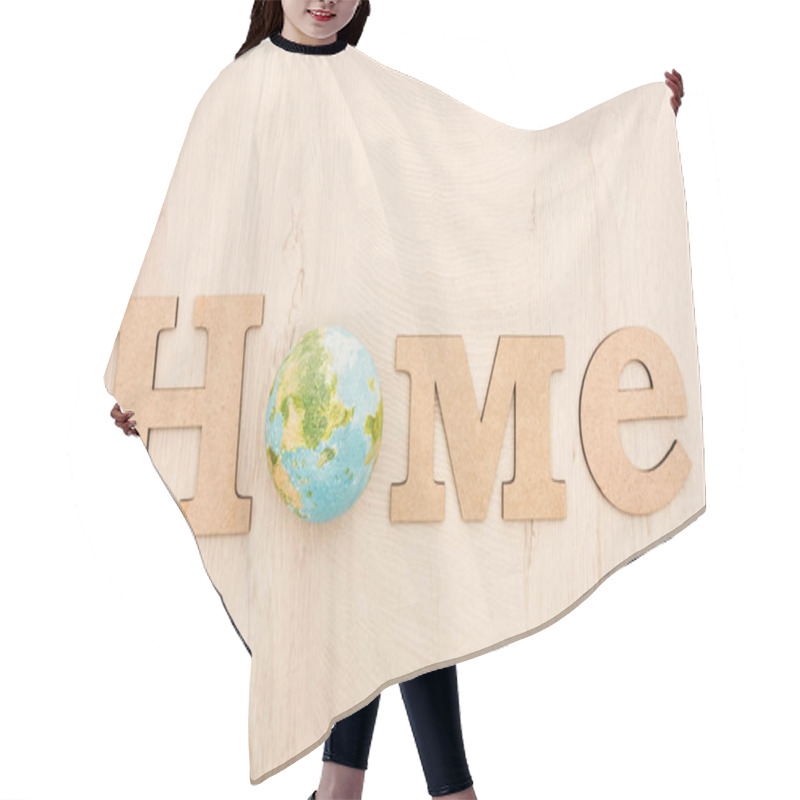 Personality  Top View Of Wooden Word Home And Toy Planet On Wooden Background  Hair Cutting Cape