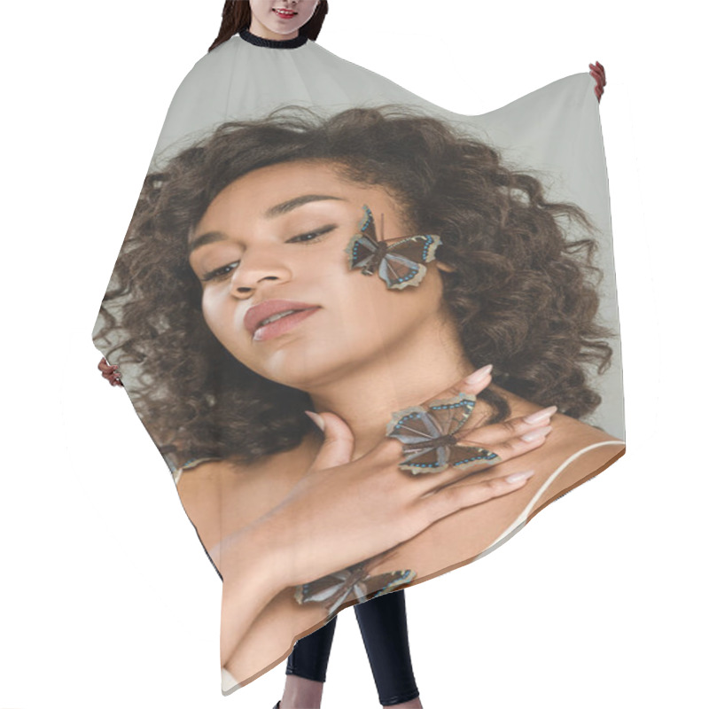 Personality  Curly African American Woman With Butterflies On Hand And Cheek Posing Isolated On Grey Hair Cutting Cape