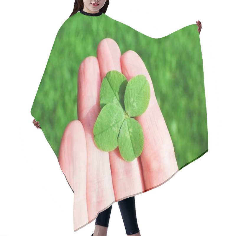 Personality  Four-leaf Clover In A Hand. Concept Saint Patricks Day, Lucky Charm,... Hair Cutting Cape