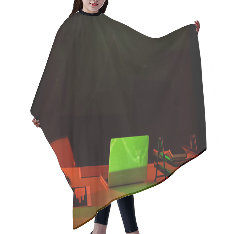 Personality  Documents With Charts And Gadgets On Table On Black Background  Hair Cutting Cape