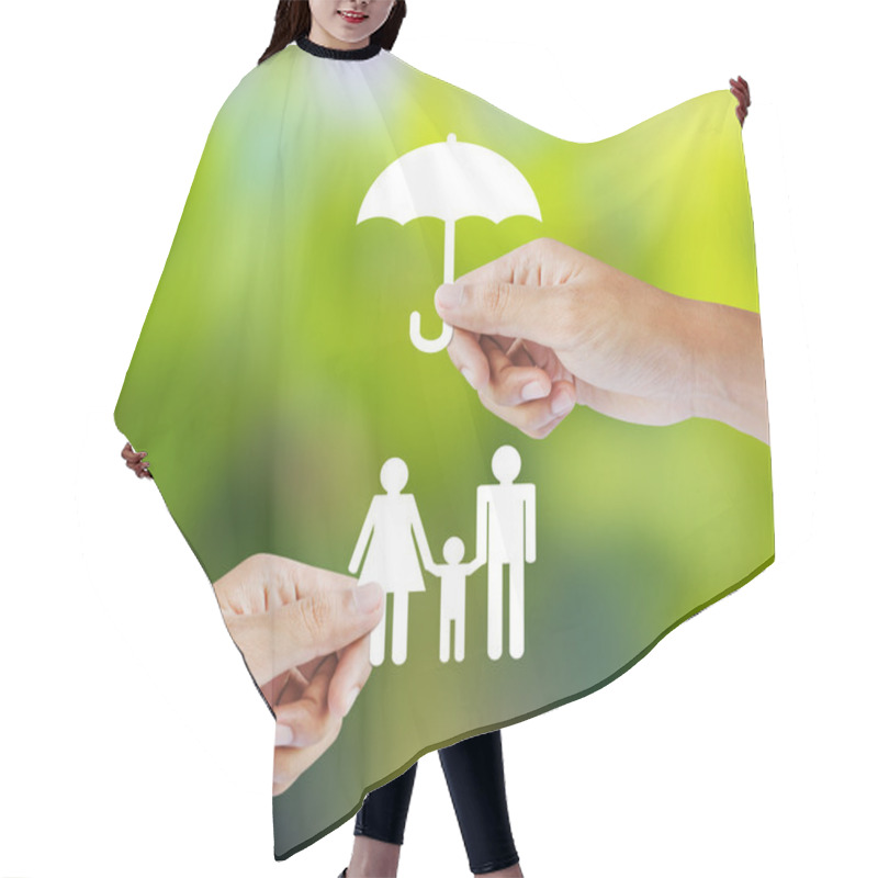 Personality  Hand Holding A Paper Family And Umbrella On Green Background, Insurance Concept Hair Cutting Cape