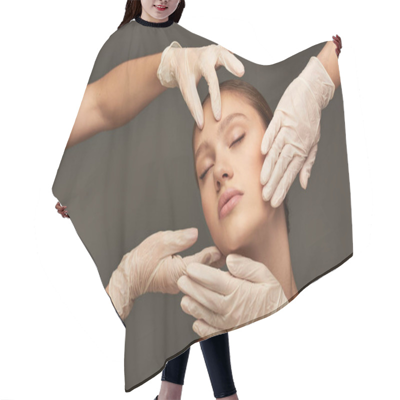 Personality  Estheticians In Medical Gloves Examining Face Of Young Woman With Closed Eyes On Grey Background Hair Cutting Cape