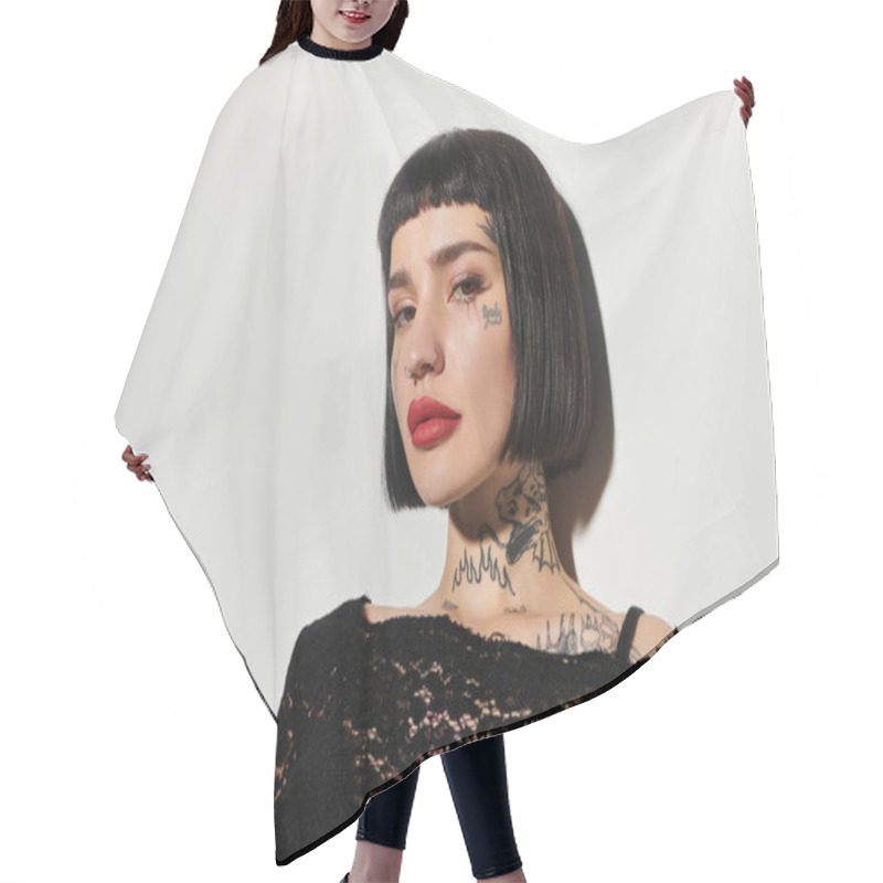 Personality  A Stylish Young Woman Poses Confidently, Highlighting Her Tattoos. Hair Cutting Cape