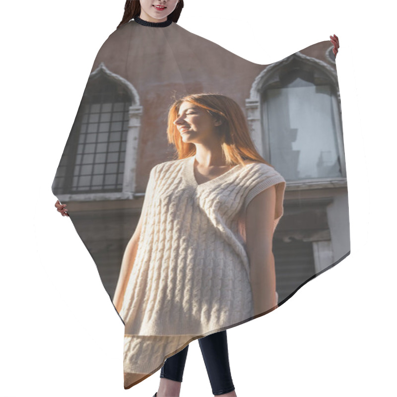 Personality  Young Woman In Sleeveless Jumper Smiling Near Blurred Building In Venice Hair Cutting Cape