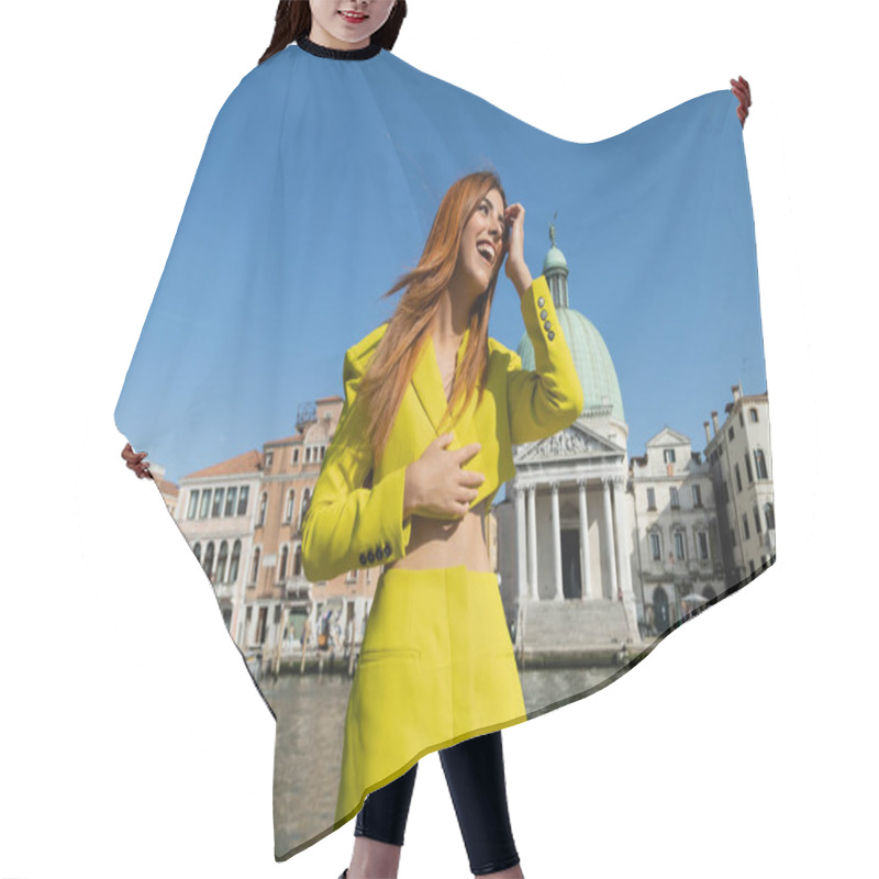 Personality  Low Angle View Of Trendy Woman Touching Red Hair While Laughing In Venice Hair Cutting Cape