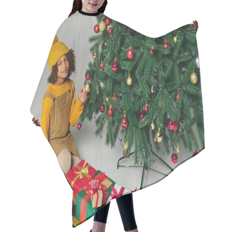 Personality  A Cheerful Girl Places Ornaments On A Vibrant Christmas Tree Surrounded By Wrapped Gifts. Hair Cutting Cape