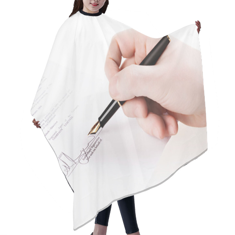 Personality  Close Up Of A Hand Signing A Document. Please Note That The Sign Hair Cutting Cape