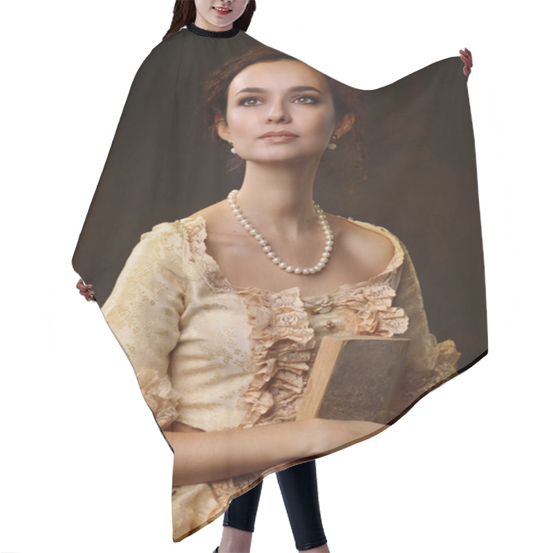 Personality  Portrait Of Woman In Historical Dress With A Book In Their Hands Hair Cutting Cape