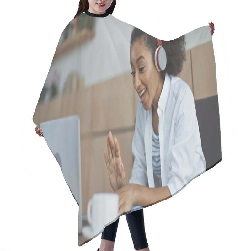 Personality  Happy African American Businesswoman In Wireless Headphones Having Video Chat In Cafe Hair Cutting Cape