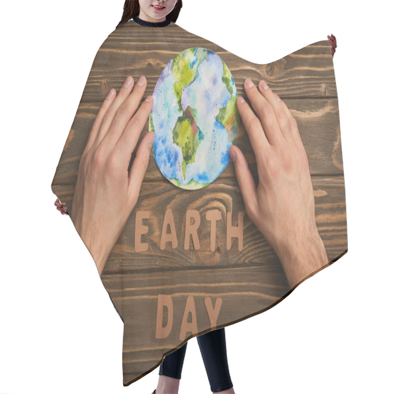 Personality  Partial View Of Woman Holding Planet Picture And Paper Letters On Brown Wooden Background, Earth Day Concept Hair Cutting Cape