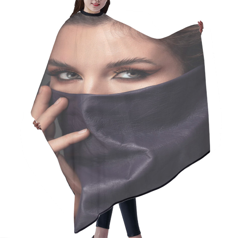 Personality  Portrait Of A Woman With Striking Eye Makeup And Leather Wild Rag Covering Her Face. Hair Cutting Cape