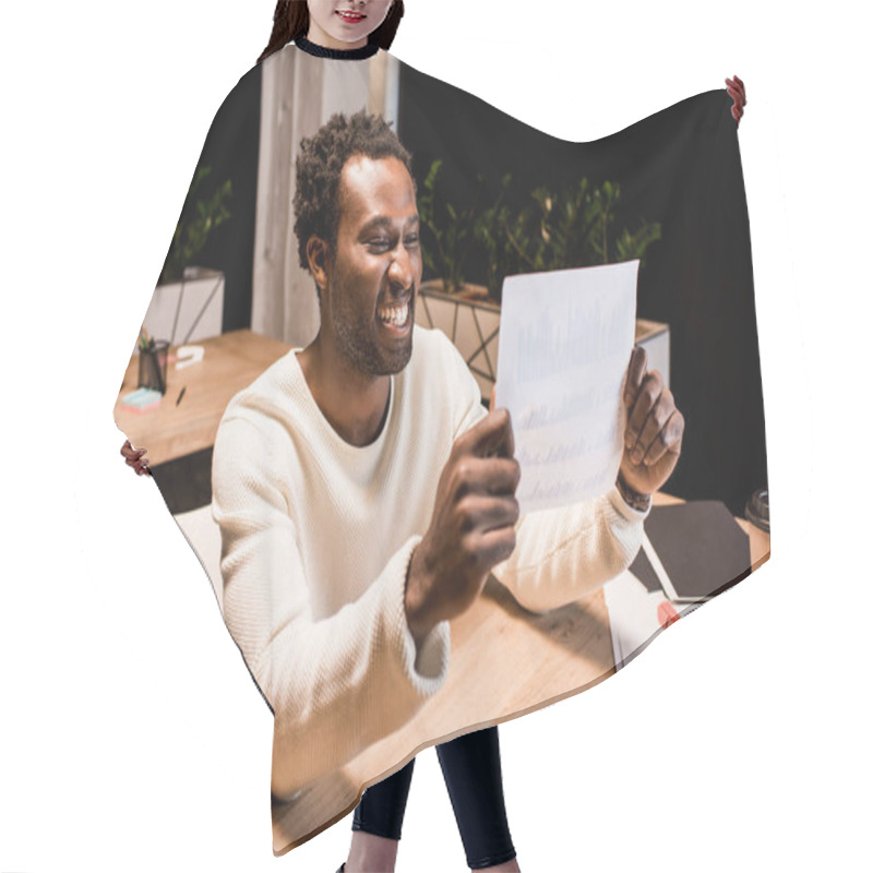 Personality  Happy African American Businessman Looking At Paper While Working At Night In Office Hair Cutting Cape