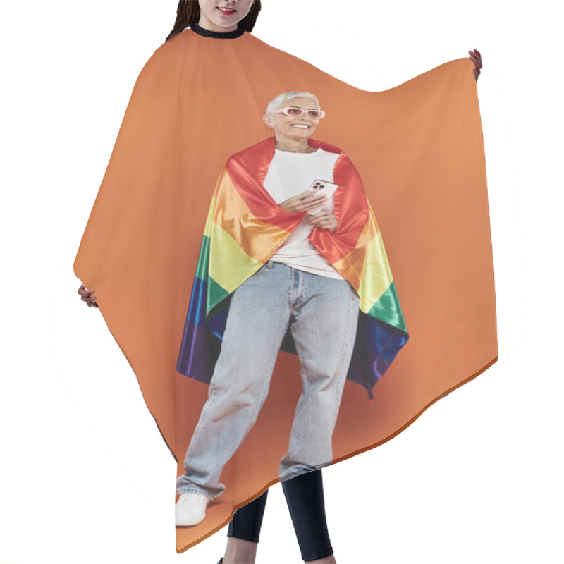 Personality  Mature Woman Proudly Embraces Her Identity With A Rainbow Flag. Hair Cutting Cape