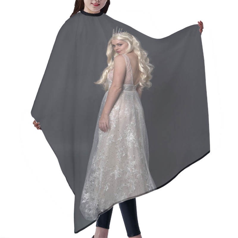 Personality  Full Length Portrait Of Beautiful Women With Long Blonde Hair, Wearing Fantasy  Princess Crown And Elegant White Ball Gown, Standing Pose With Hand Gesture. Isolated On Dark Grey Studio Background. Hair Cutting Cape