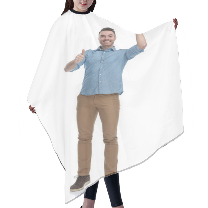 Personality  Positive Casual Man Pointing Up And Gesturing Ok While Wearing Blue Shirt, Standing On White Studio Background Hair Cutting Cape