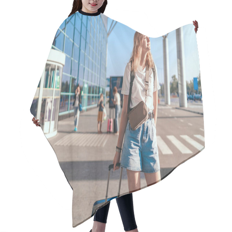 Personality  Travel Woman Tourist With Backpack And Hand Luggage Suitcase Standing Near International Airport Terminal Waiting For Boarding. Active Lifestyle Concept Hair Cutting Cape