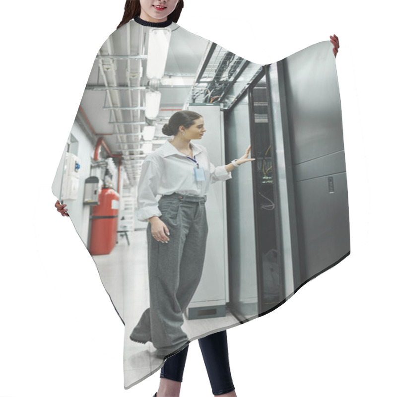 Personality  A Woman In A White Shirt Inspects Server Hardware While Ensuring Digital Security In A Tech Setting. Hair Cutting Cape