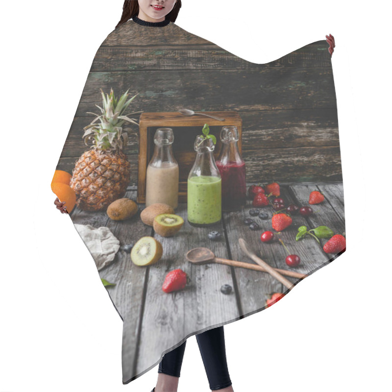 Personality  Delicious Detox Smoothies In Glass Bottles On Rustic Wooden Board With Assorted Fruits Hair Cutting Cape