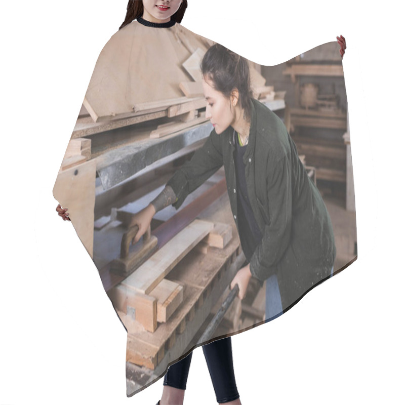 Personality  Side View Of Tattooed Carpenter Polishing Wooden Plank In Workshop  Hair Cutting Cape