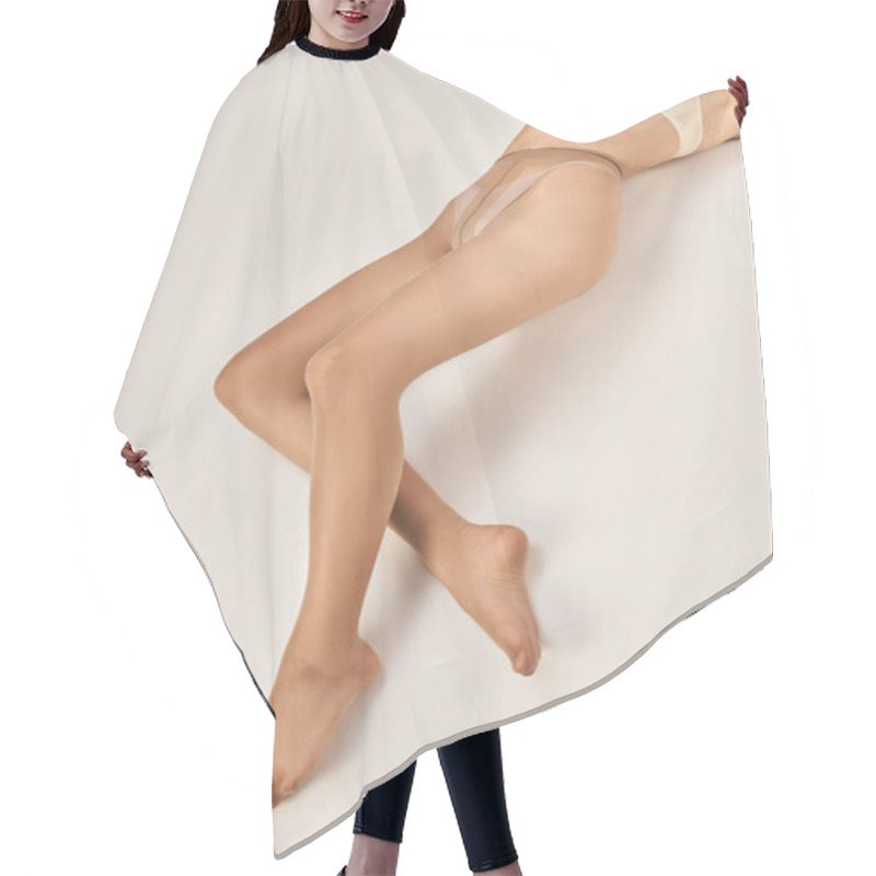 Personality  Partial View Of Young Woman In Beige Seamless Pantyhose Lying On Grey Background, Hosiery Hair Cutting Cape