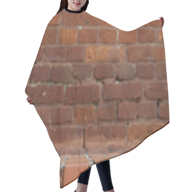 Personality  Close-up Of Textured Brick Wall With Warm Tones And A Rustic Feel. Hair Cutting Cape