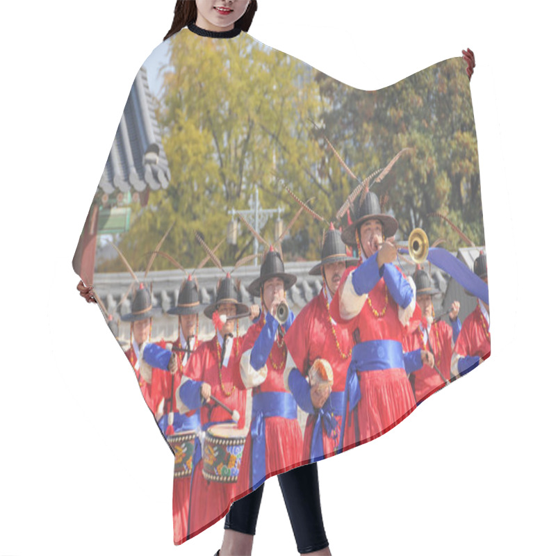 Personality  SEOUL, SOUTH KOREA - OCTOBER 27, 2022: Korean Ancient Old Soldier Warriors Guard Changing Event In Gyeongbokgung Palace Front Ground. Hair Cutting Cape