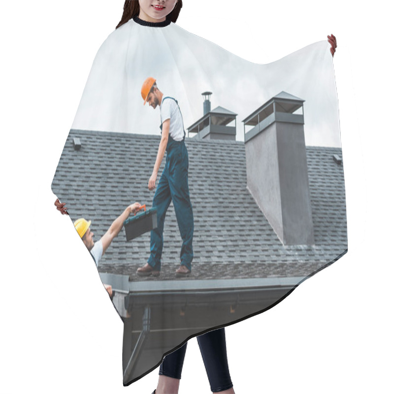 Personality  Handyman In Helmet Giving Toolbox To Handsome Colleague Standing On Rooftop  Hair Cutting Cape