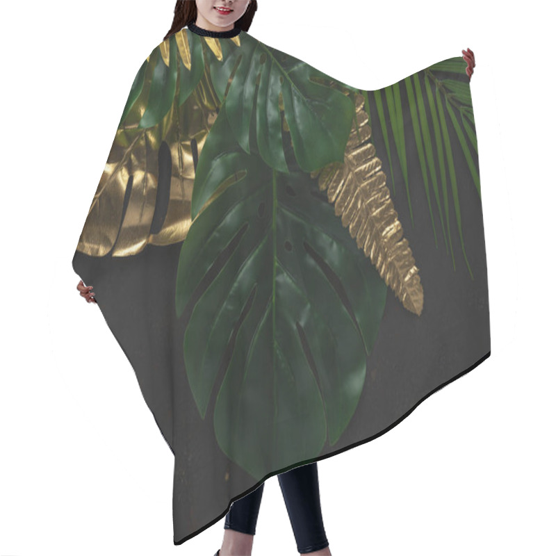 Personality  Creative Layout With Gold And Green Tropical Palm Leaves On Black Background. Minimal Summer Abstract Pattern. Hair Cutting Cape