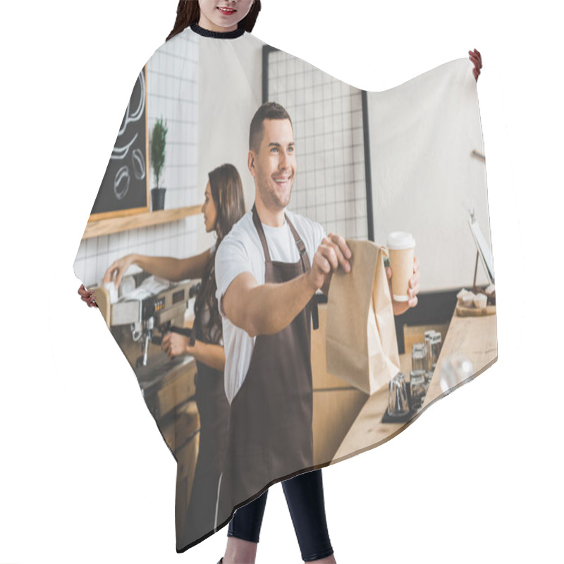 Personality  Handsome Cashier Giving Paper Cup And Bag Wile Barista Making Coffee Behind Bar Counter In Coffee House Hair Cutting Cape