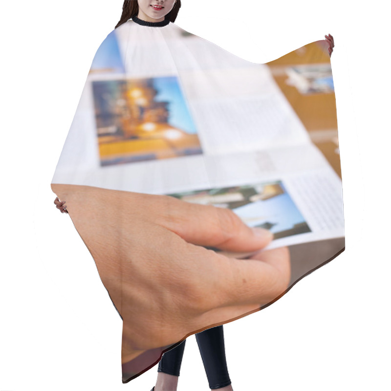 Personality  Woman Reading A Brochure Hair Cutting Cape