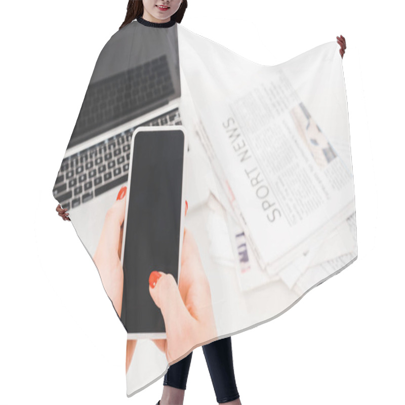 Personality  Selective Focus Of Woman Holding Smartphone With Blank Screen Near Laptop And  Newspapers Hair Cutting Cape