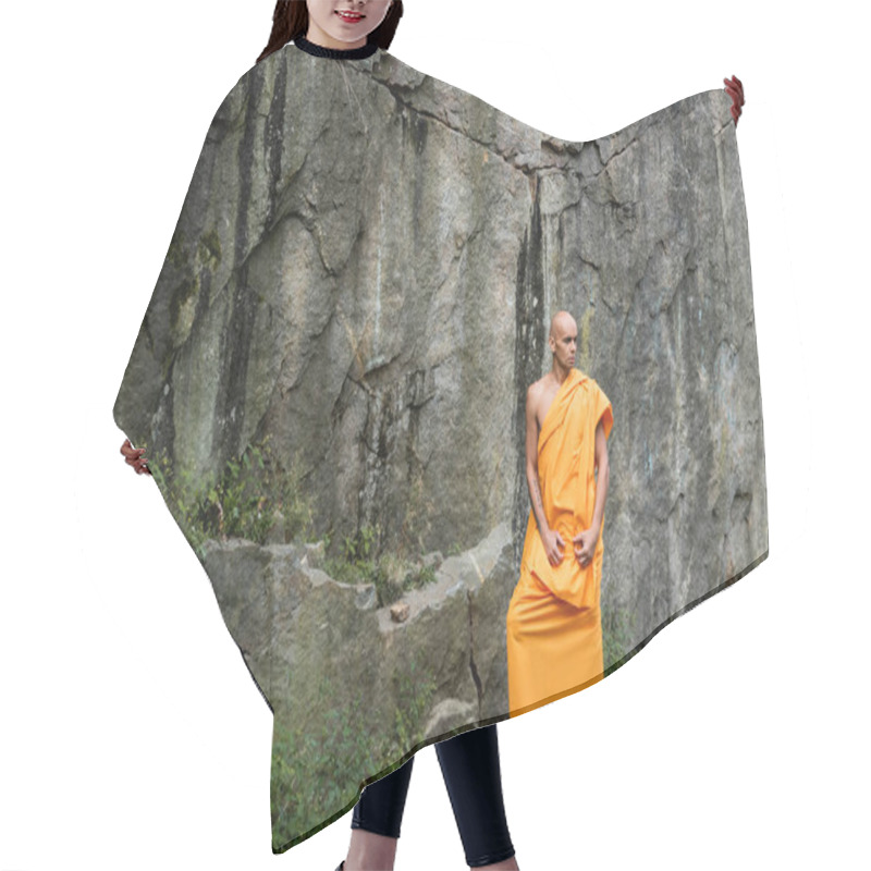 Personality  Full Length View Of Barefoot Buddhist In Orange Robe Standing Near Rock Hair Cutting Cape