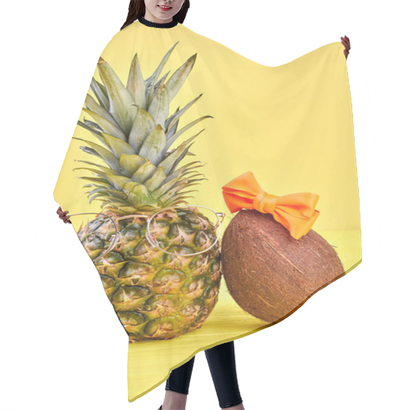 Personality  Composition From Pineapple And Coconut. Hair Cutting Cape