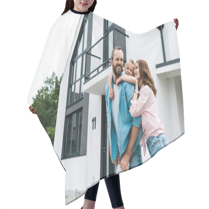 Personality  Happy Bearded Man Piggybacking Daughter Near Cheerful Wife And Home  Hair Cutting Cape