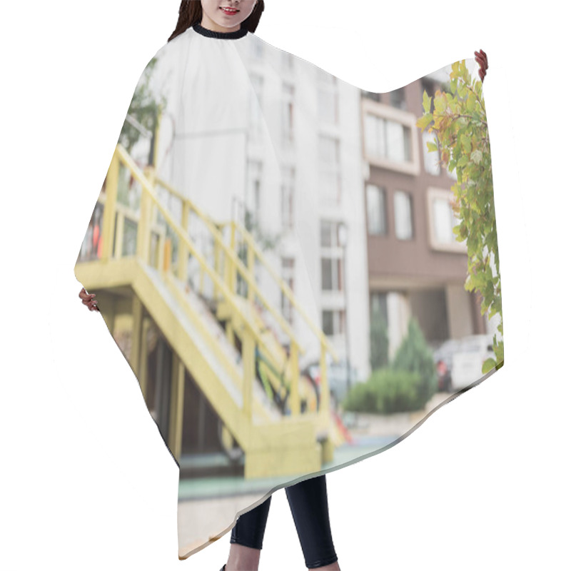 Personality  Selective Focus Of Wooden Bench And Playground On Background  Hair Cutting Cape