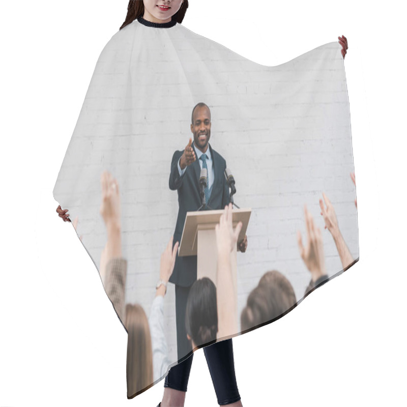 Personality  Back View Of Journalists With Raised Hands Near Happy African American Speaker Gesturing Near Microphones  Hair Cutting Cape