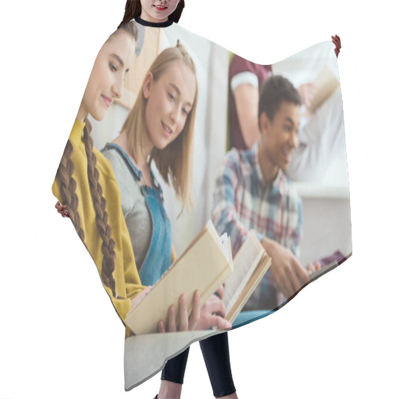 Personality  Group Of Smiling Multicultural Teenage Schoolchildren Reading Books During School Break Hair Cutting Cape