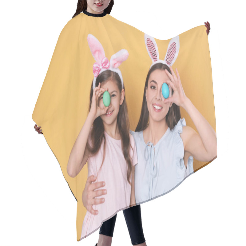 Personality  Mother And Daughter In Bunny Ears Headbands Holding Easter Eggs Near Eyes On Color Background Hair Cutting Cape