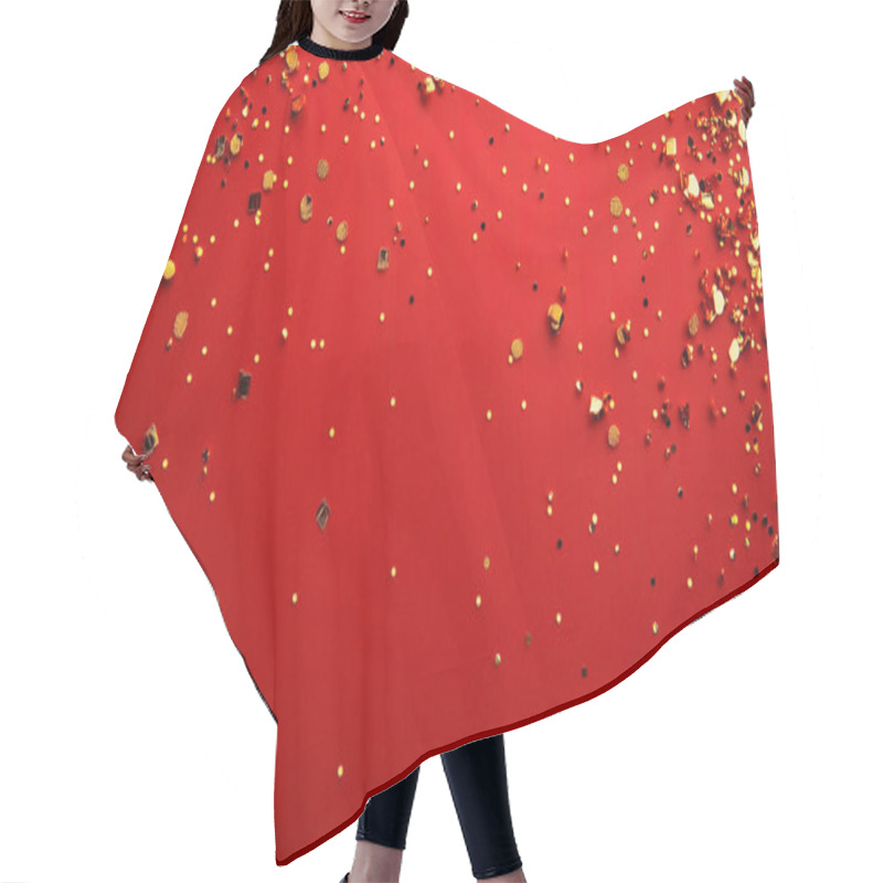 Personality  Festive Scene With Scattered Gold And Black Confetti On A Vibrant Red Background. Hair Cutting Cape