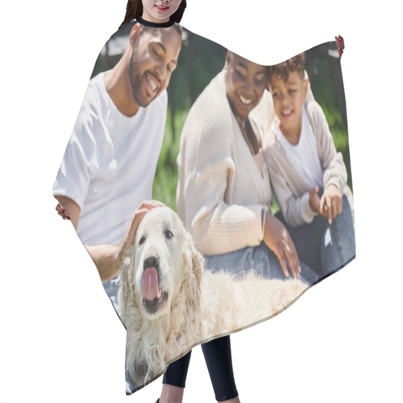 Personality  Family Moments Of Jolly African American Parents And Son Smiling And Sitting On Lawn And Petting Dog Hair Cutting Cape