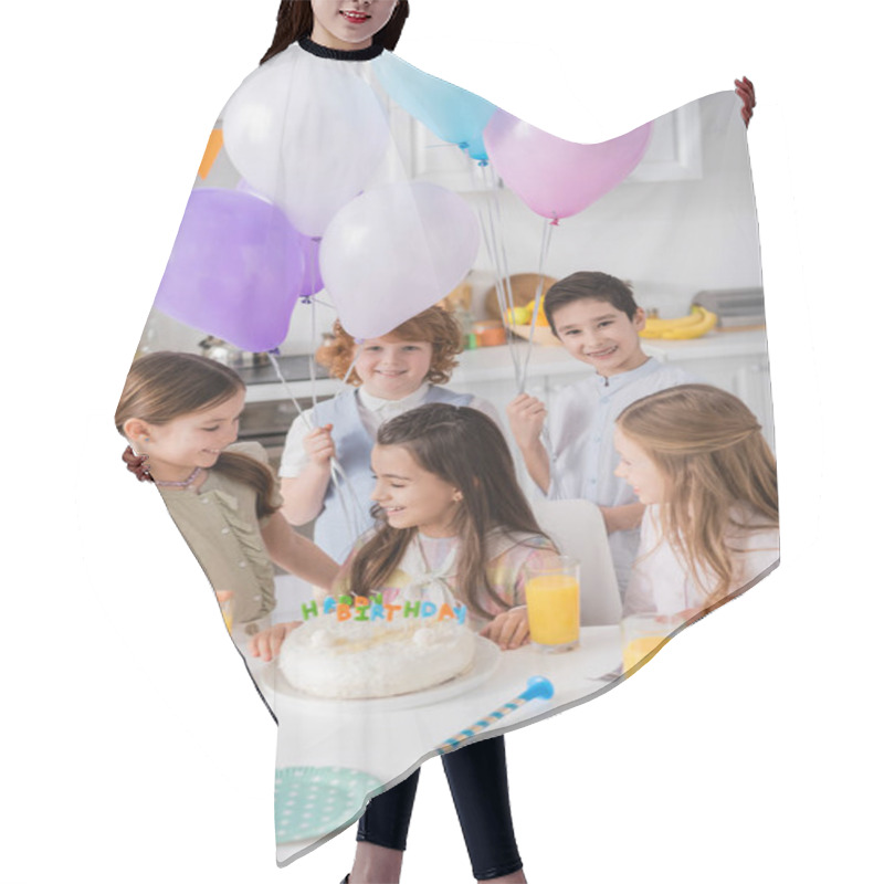 Personality  Cheerful Kids With Balloons Looking At Birthday Girl Near Cake And Party Horns On Table  Hair Cutting Cape