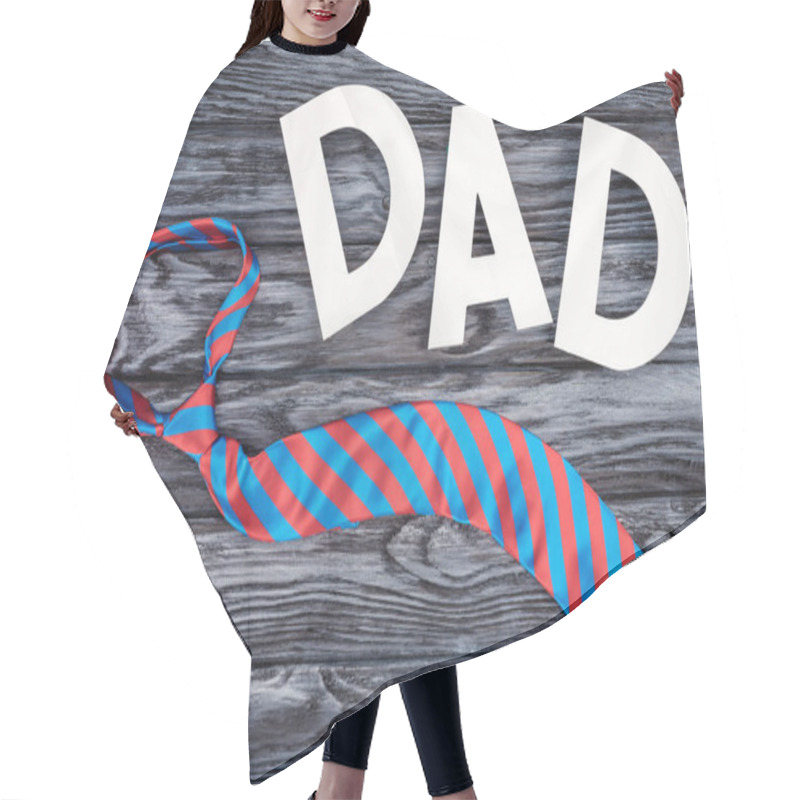 Personality  Top View Of Tie With DAD Lettering On Grey Wooden Tabletop, Happy Fathers Day Concept Hair Cutting Cape