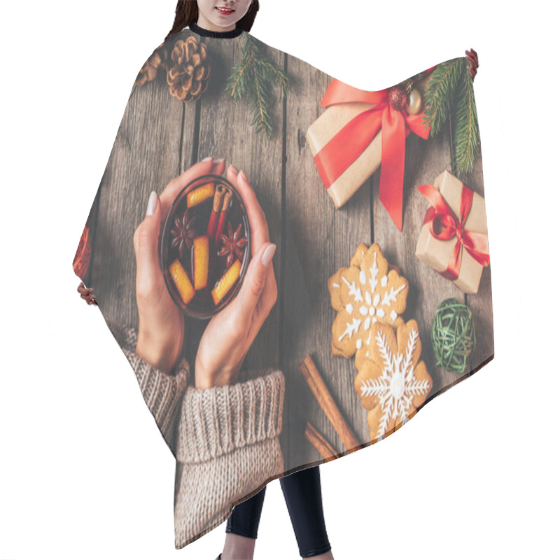 Personality  Cropped View Of Woman Holding Glass With Hot Mulled Wine On Wooden Background With Christmas Gifts Hair Cutting Cape