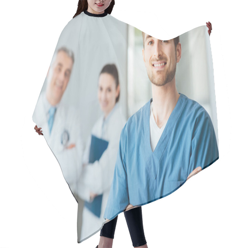 Personality  Young Doctor Posing And Smiling At Camera Hair Cutting Cape